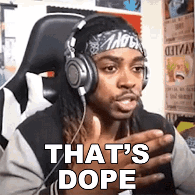 a man wearing headphones and a headband says that 's dope .