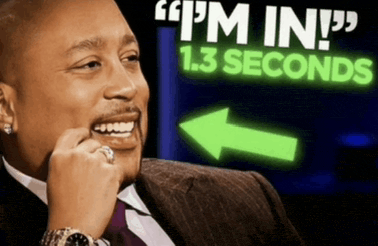 a man in a suit and tie smiles in front of a sign that says i 'm in 1.3 seconds