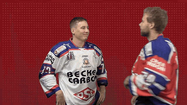 a man wearing a jersey that says becke carbco