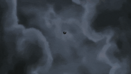 a close up of a cartoon character 's headband with a swirl in the middle