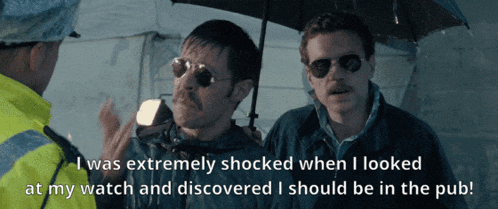 two men standing under an umbrella with a caption that says " i was extremely shocked when i looked at my watch