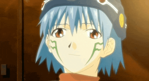 a close up of a person 's face with blue hair