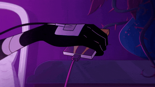 a purple background with a hand plugging a device
