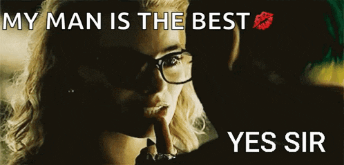a woman with glasses is kissing a man with the words " my man is the best yes sir " below her