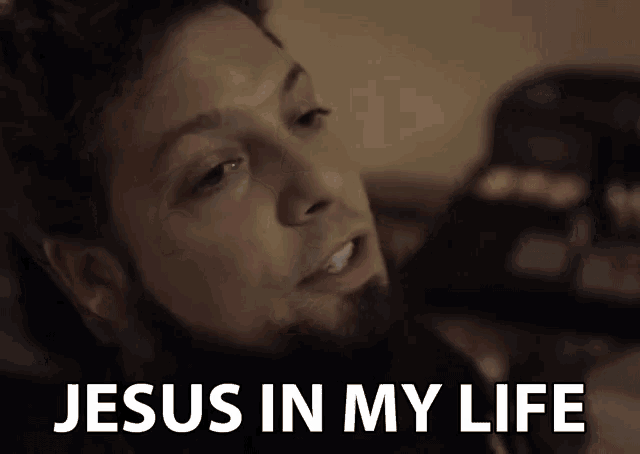 a man with a beard is saying jesus is in my life