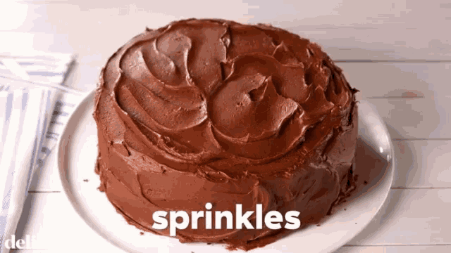 Chocolate Cake Sprinkles GIF - Chocolate Cake Sprinkles Almost Done GIFs
