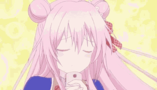 a girl with pink hair is holding a pink phone in her hand