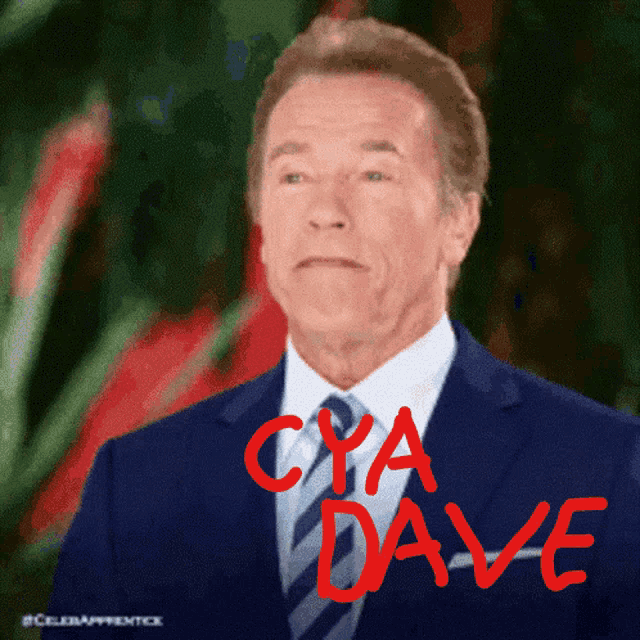 a man in a suit and tie with the words cya dave written in red