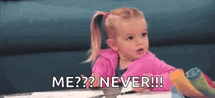 a little girl is sitting at a table saying `` me ? never !! ''