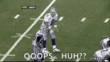a football player with the number 9 on his jersey is being tackled by another player on a field .