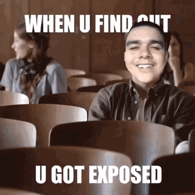 a young man sits in a classroom with a meme that says when u find out u got exposed