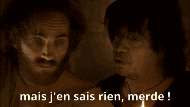two men standing next to each other with the words mais j'en sais rien merde
