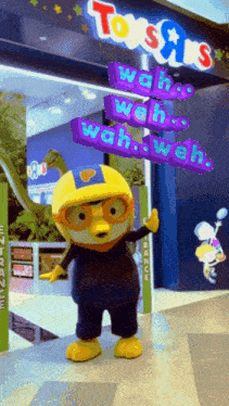 a toys r us store with a mascot in front