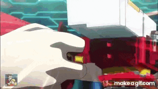 a person is holding a red and white robot in their hand in a video game .