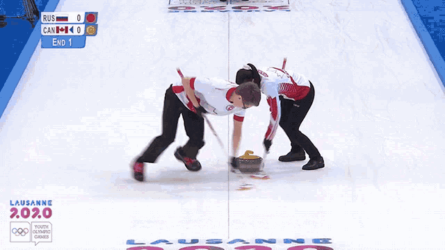 a curling game is being played in lausanne during the 2020 olympic games
