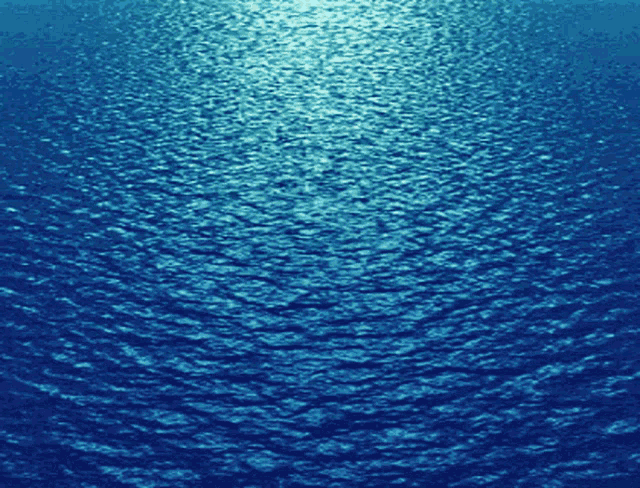 a close up of a blue water surface
