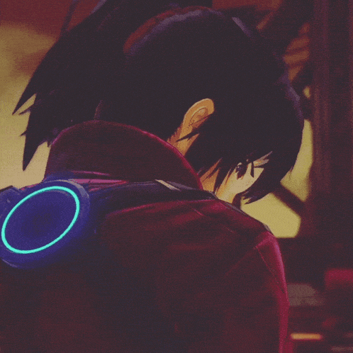 a close up of a person 's face with a blue circle on their back