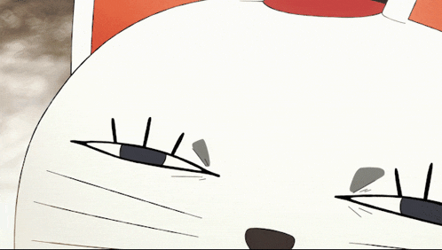 a close up of a cartoon cat 's face with a red collar