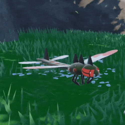 a dragonfly with red and white wings is sitting in the grass .