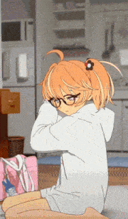 a girl with glasses and a flower in her hair sits on the floor