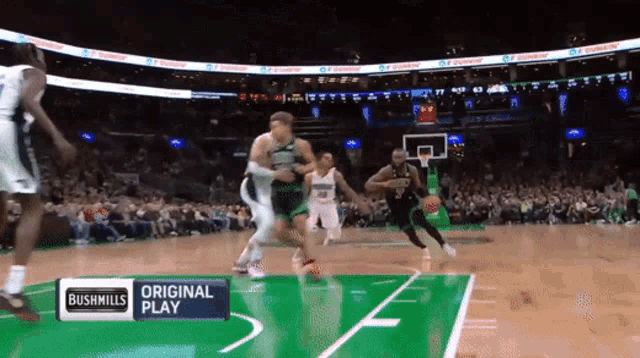 a basketball game is being shown on bushmills