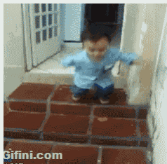 a child is standing on a brick floor with a gifini.com watermark