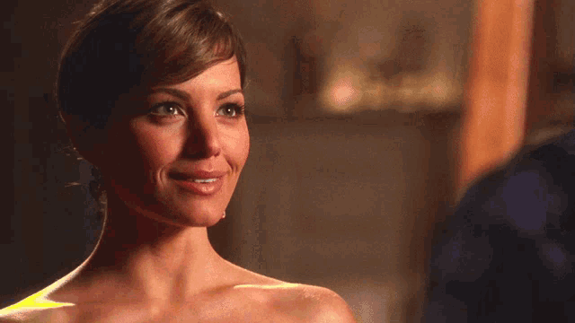 a woman is smiling with the words anything is possible clark below her