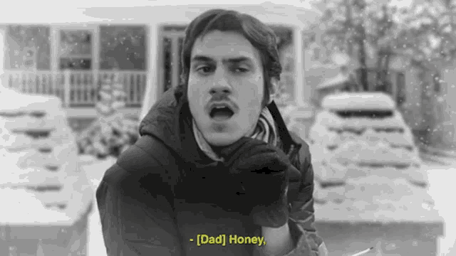 a black and white photo of a man smoking a cigarette with the words " dad honey " below him