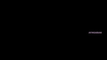 a man is crying in front of a crowd of people .