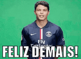 a soccer player wearing a fly emirates jersey says feliz demais !