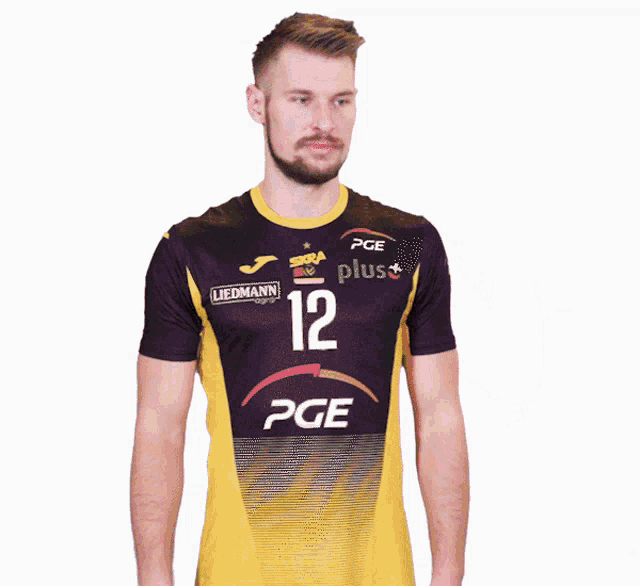 a man wearing a pge jersey is holding a gift box