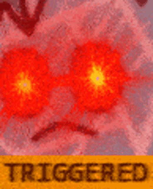 a close up of a person 's face with red eyes and the words `` triggered '' .