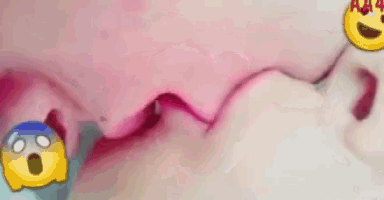 a close up of a person 's mouth with a smiley face on it and a pink background .