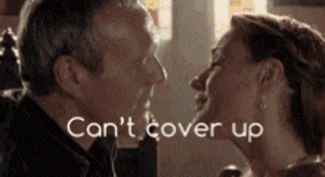 a man and a woman are kissing with the words can 't cover up written on the bottom