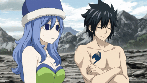 a man with a fairy tail tattoo on his chest is standing next to a girl with blue hair