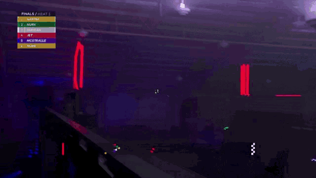 a dark room with a scoreboard that says finals / heat 1 at the top