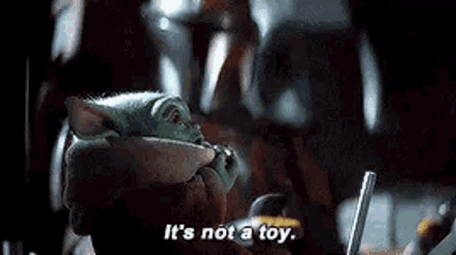The Mandalorian Baby Yoda GIF - The Mandalorian Baby Yoda Its Not A Toy GIFs