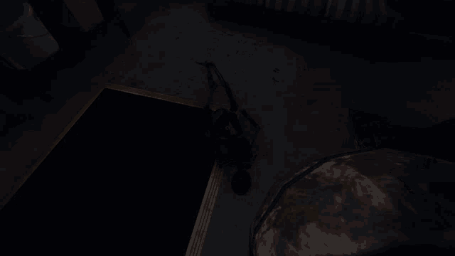 a dark room with a yellow stripe on the floor and a water cooler