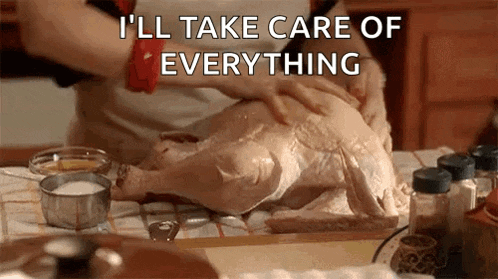 a person is cooking a turkey on a table and says `` i 'll take care of everything '' .