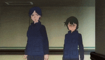 two anime characters standing next to each other in a hallway