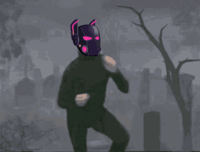 a man in a black turtleneck with a purple mask on his head