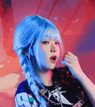 a girl with blue hair is wearing a black shirt with the number 9