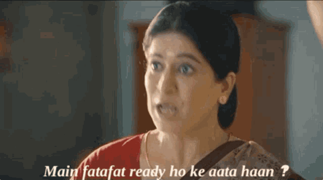 a woman with a surprised look on her face says main fatafat ready ho ke aata haan ?