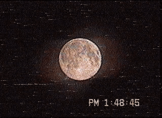 a picture of a full moon with the time 1:48 45