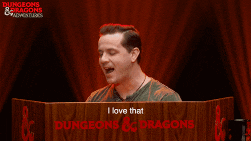 a man behind a podium that says i love that dungeons and dragons