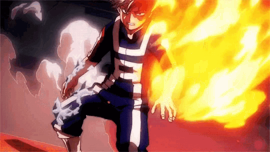 todoroki shouto from my hero academia is surrounded by flames and ice .