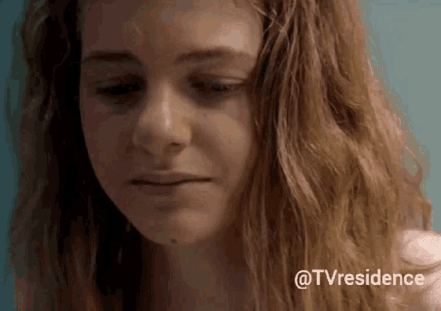 a close up of a woman 's face with the hashtag tvresidence