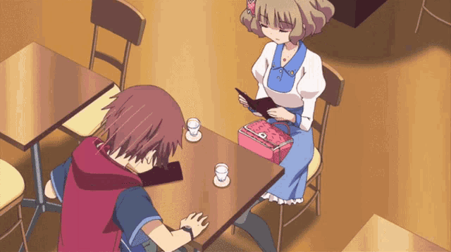 a girl is sitting at a table looking at a menu while a boy sits at the table