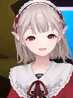 a close up of a girl with short hair and red eyes wearing a headband and a red dress .