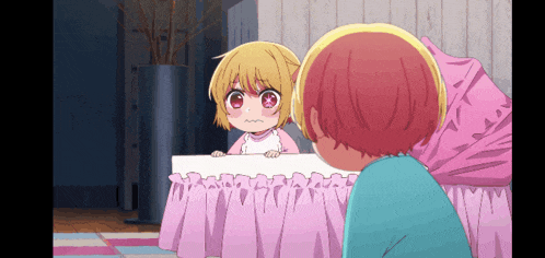 a little girl with red eyes is looking at a boy